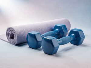 Dumbbells and yoga mat